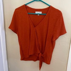 Madewell orange wrap blouse.